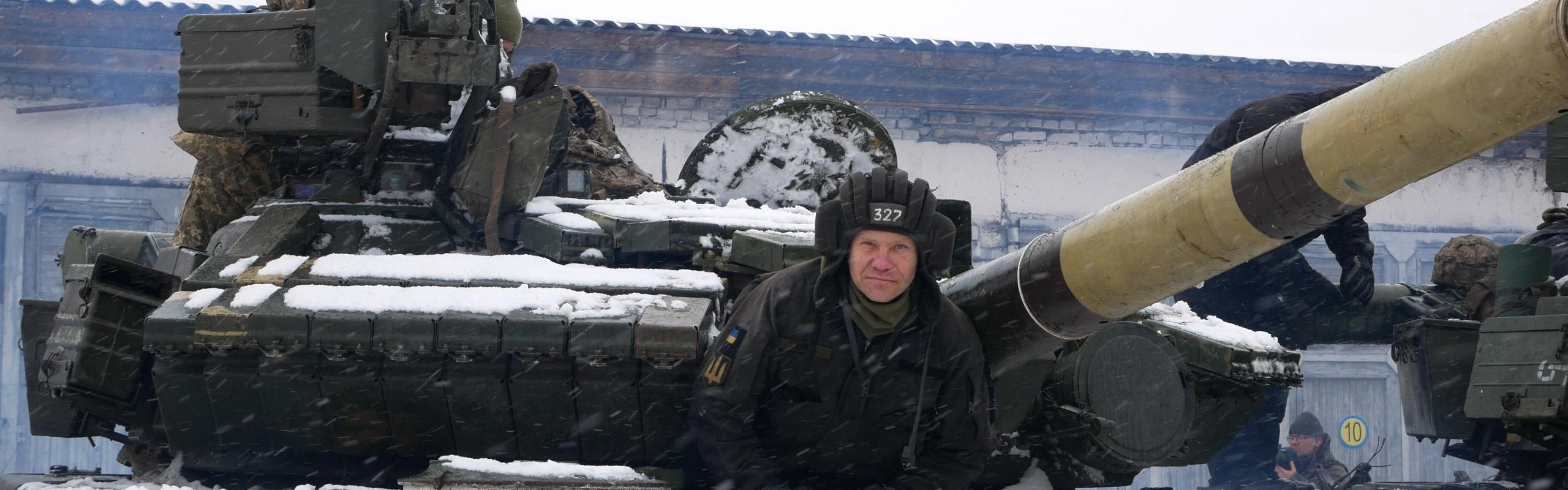 A Ukrainian Army tank operator in Kharkiv prepares for the Russian invasion.