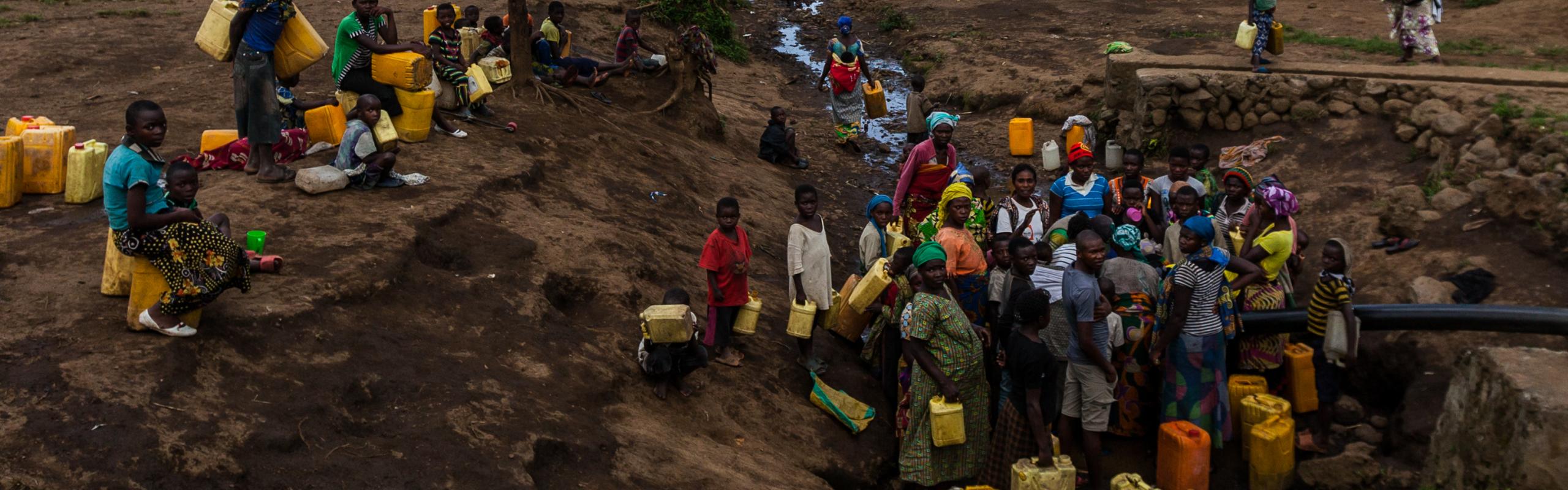 People in the queue waiting to get some water in eastern Congo