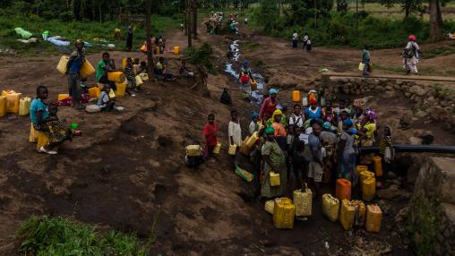 People in the queue waiting to get some water in eastern Congo