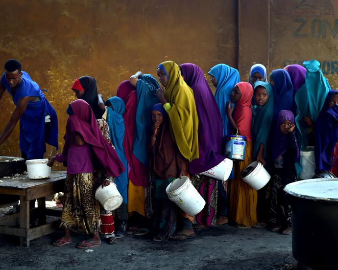 Young girls line up at a feeding centre in Mogadishu.